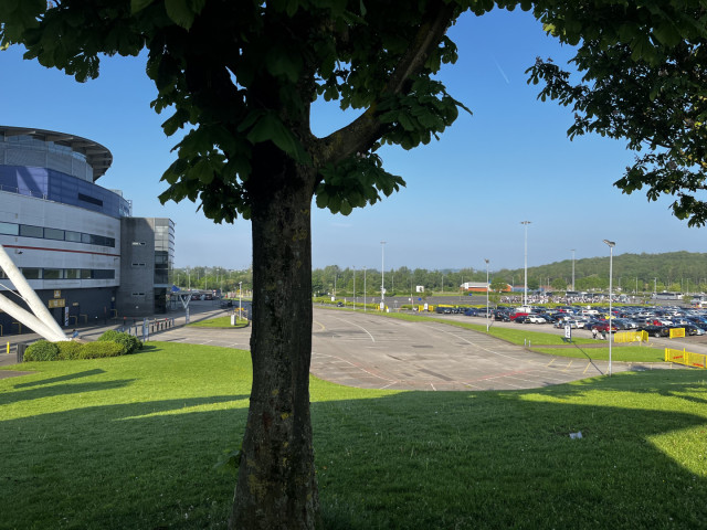 Bolton fans queueing for coaches to Wembley outside the Reebok Stadium, May 2024