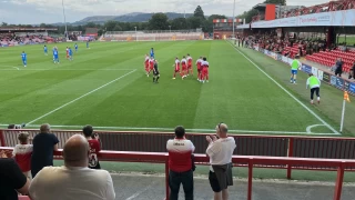 Accrington Stanley clebrate Kelsey Mooney's goal near the corner flag in their 2-1 victory over Peterborough United at the Wham Stadium