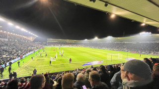 Home Park under the lights on a dark evening, taken from the Barn Park End before kick-off